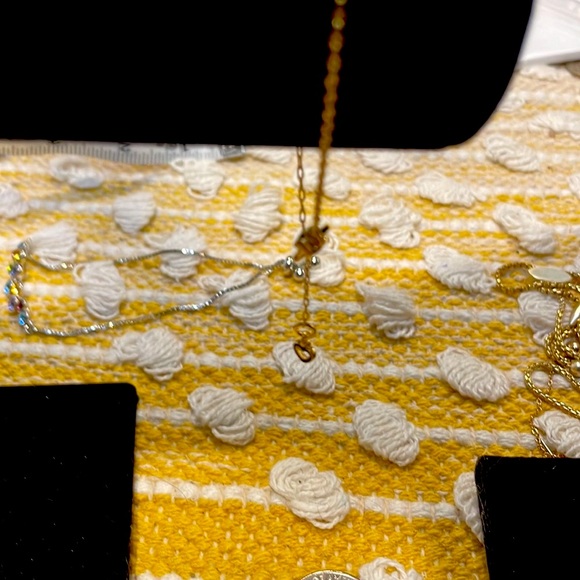 Very cute Kate Spade bracelet that says love twice with a pink stone in middle. - Picture 3 of 4